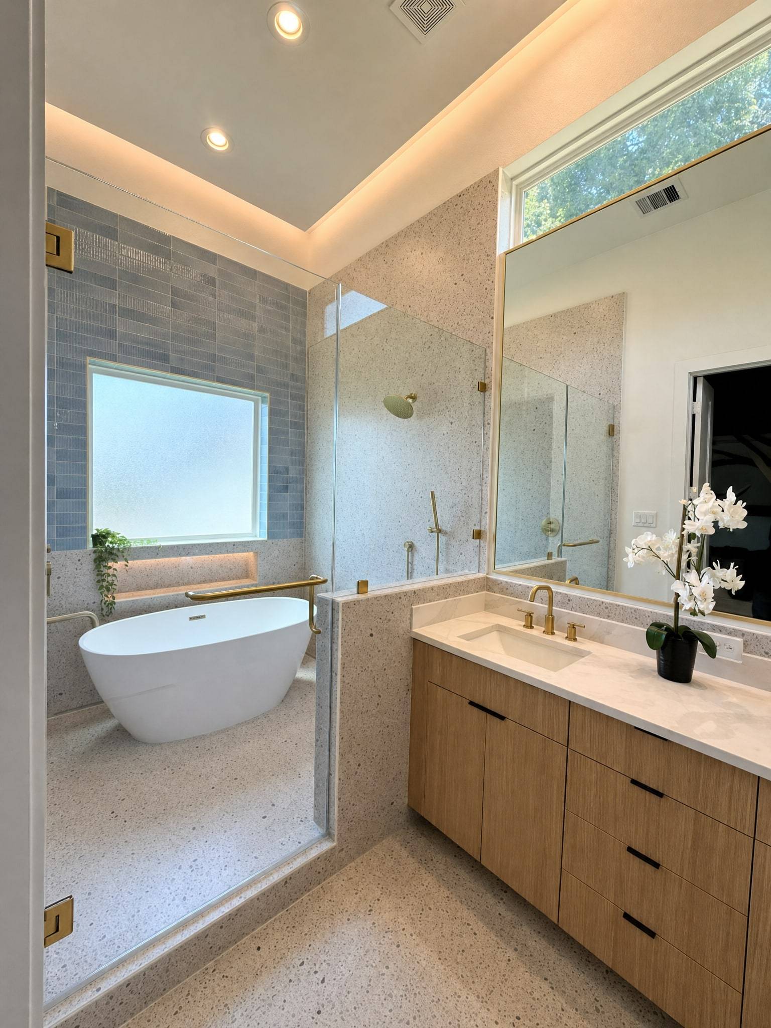 Custom frameless shower in a spa-style master bath